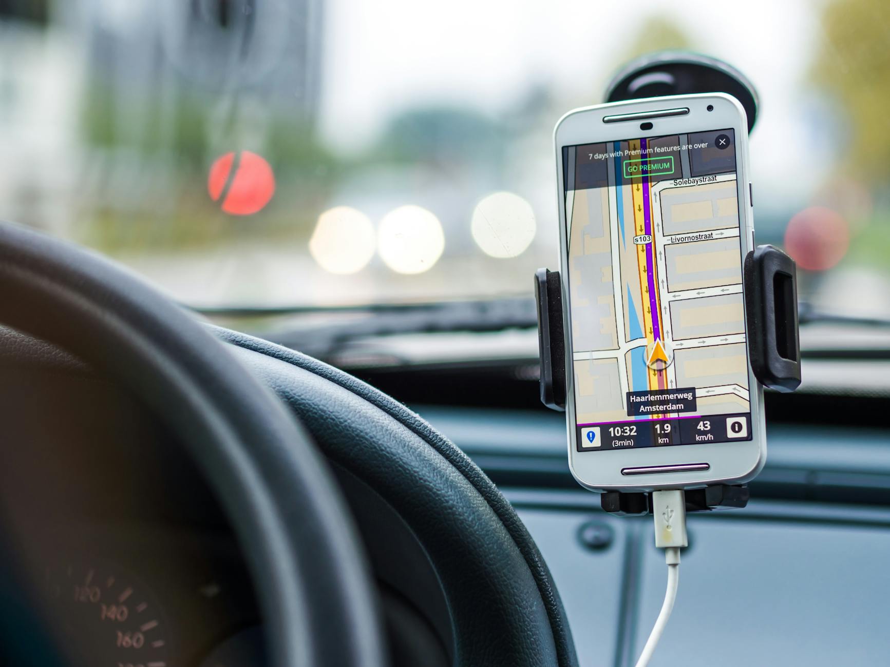 Do you regularly use a phone caddy in your vehicle while driving?