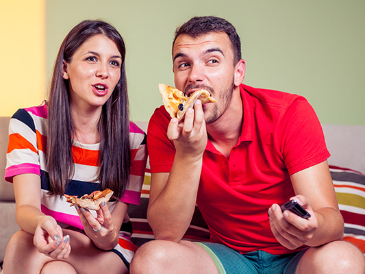 Do you regularly watch TV while eating meals at home?